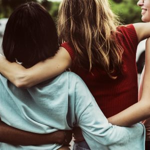 Diverse Group of Women Arm in Arm